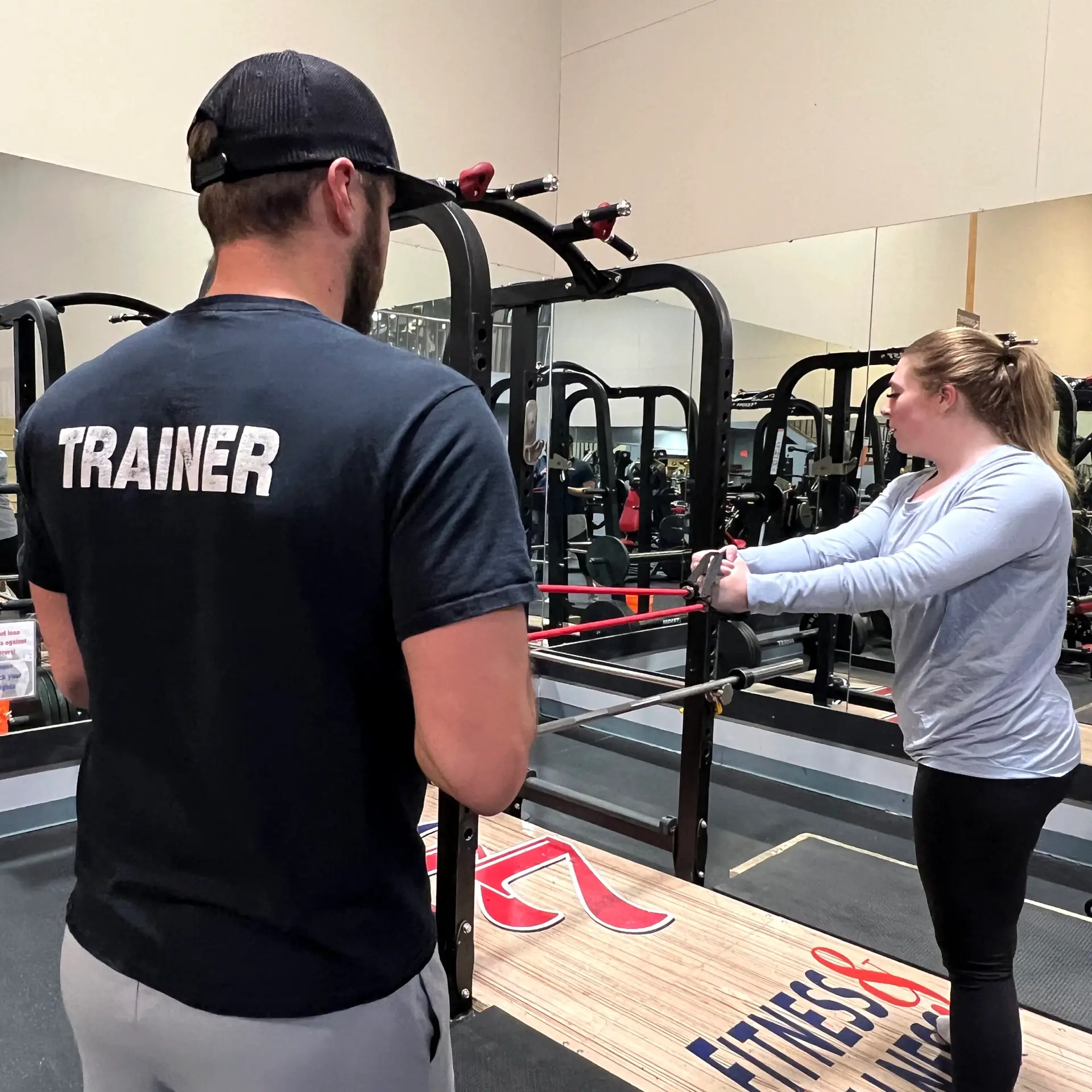 Personal Trainer working with client at 777 Fitness and Wellness Center, a premier Billings Montana gym